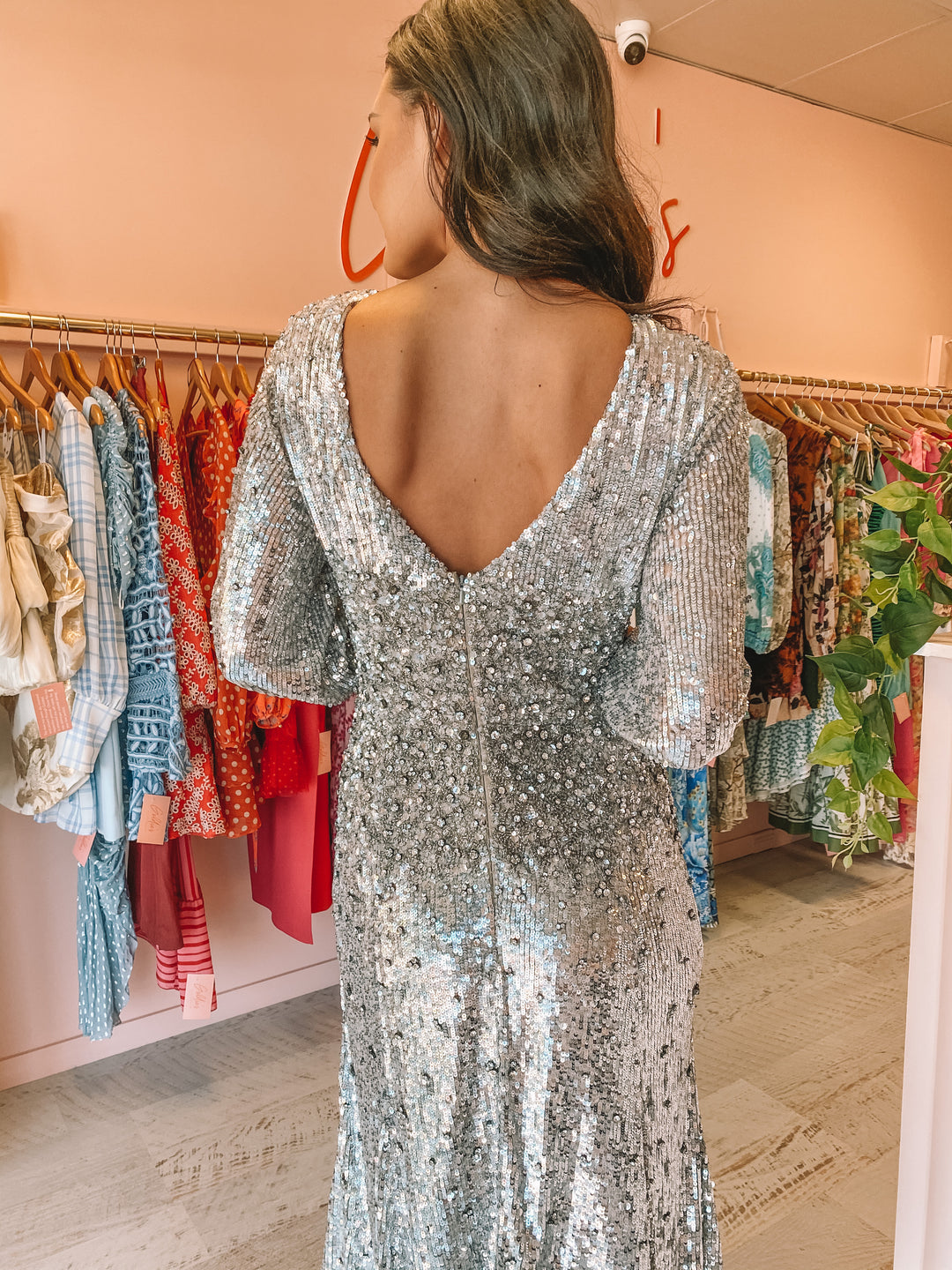 rachel gilbert silver dress Discover what is signature to Rachel Gilbert with the Rosalie Gown. Adorned with individually hand placed and sewn silver embellishments taking upward of 150 hours to create each garment